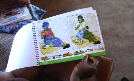 An information and training booklet on breastfeeding is used at a breastfeeding workshop in Sierra Leone. Photo: Irish Aid/Paul Sheehan