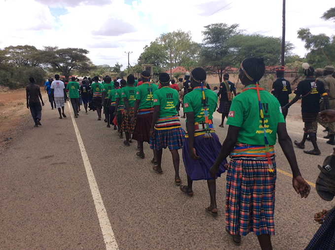 Karamajong (young girls and boys) marching for Aids to the venue of the launch