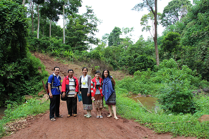 Áine (right) pictured with central and provincial Ministry of Health officials during an observation research field visit in Saravanne, Laos. ©: Áine Lynch / Unicef